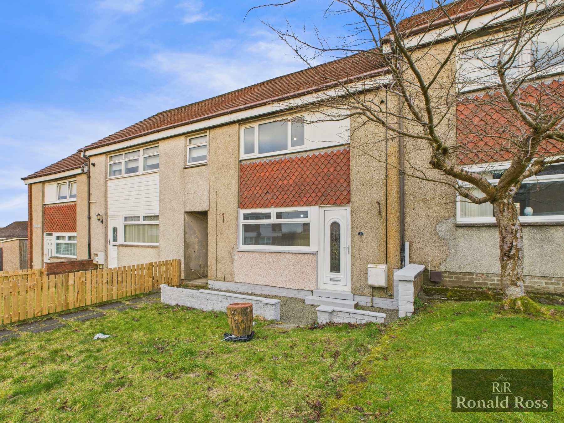 A terraced family home with tiled feature frontage from a Ronald Ross listing